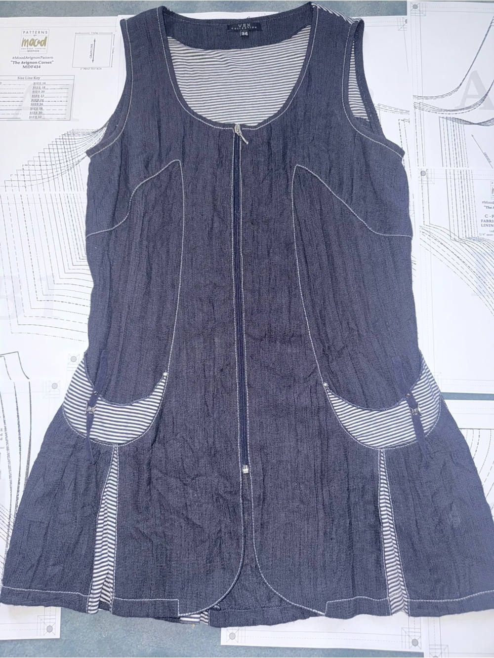 Sleeveless Navy Zip-Front Tunic with Striped Pocket Trim